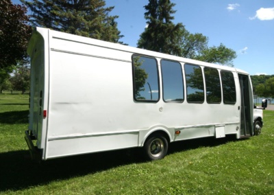 Limo Coach 22 Passenger Turtle Top Passenger Rear View